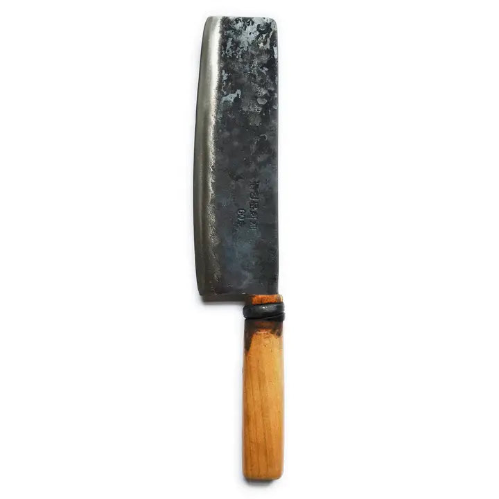 Master Shin's vegetable knife with dark metal blade and light wooden handle