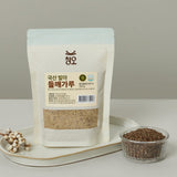 Germinated perilla seed powder pouch with grain powder in a small bowl