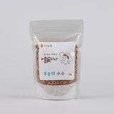 Sealed pouch of red millet grains