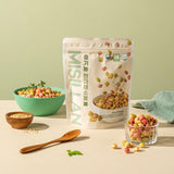 Organic cereal bag with green bowl and glass cup filled with colorful puffs