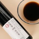 Low sugar soy sauce bottle with black body and white label