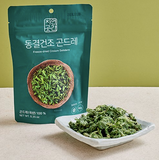 Freeze-dried thistle (cirsium) greens namul in a green stand-up pouch with serving bowl