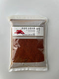 1 kg gochugaru chili powder in sealed clear bag, red flakes