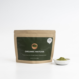 Matcha powder pouch with small bowl of finely ground green tea powder