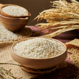 Roasted rice grains in a wooden bowl