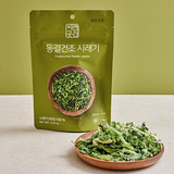 Freeze-dried radish leaves greens namul in a green stand-up pouch with serving bowl
