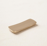 Bronzeware cutlery rest, rectangular with rounded ends, light bronze finish