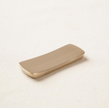 Bronzeware cutlery rest, long curved rectangle with smooth rounded edge