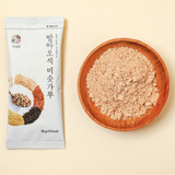 Germinated 5-colored rice powder sachet and bowl of fine beige powder.