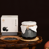 Apple ginger extract jar with white cloth seal tied with twine bow