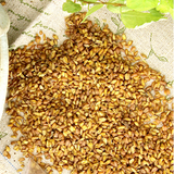 Buckwheat grains scattered on a fabric sack