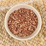Bowl of red millet grains