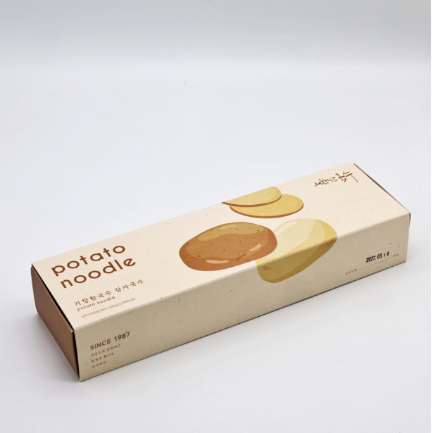 Potato noodles package with illustrated potato slices on a rectangular carton