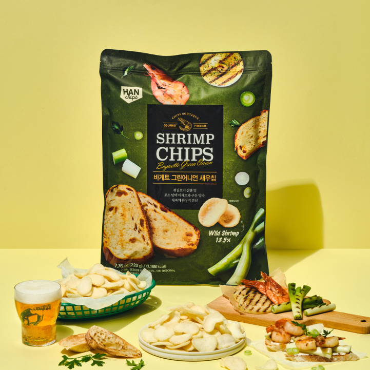 Shrimp chips bag with green onion flavor, with bowl of chips and shrimp skewer
