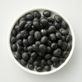 Bowl of black soybean kernels