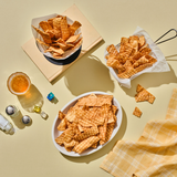Overhead plates of fried fish chips with crisp crinkle-cut pieces