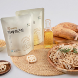 Crispy brown rice lotus root chips with two resealable bags and wooden serving bowl
