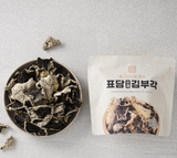 Seaweed crisps in a bowl, with a white snack pouch beside them