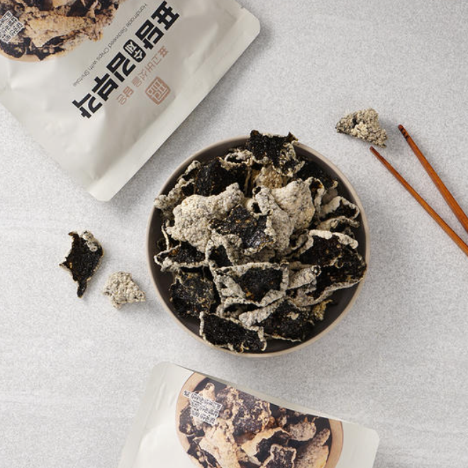 Seaweed crisp bowl with snack pouch and chopsticks on a light surface