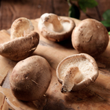 Shiitake mushrooms on a wooden board