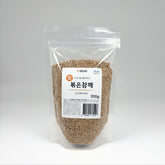 Roasted sesame seeds in clear plastic pouch