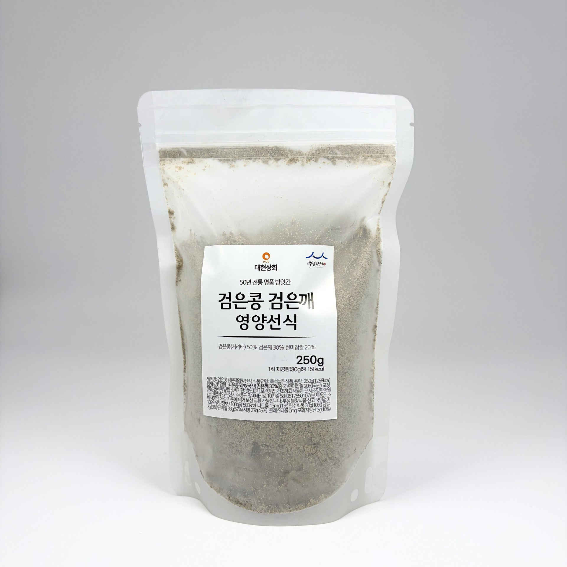 Stand-up pouch of light-gray powder with printed label