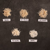 Loose rice samples labeled Brown, 30%, 50%, 70% milled, and White
