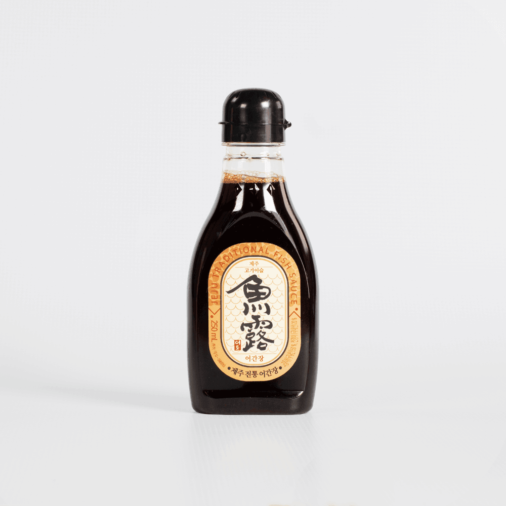 Traditional fish sauce bottle, dark brown glass with metal cap