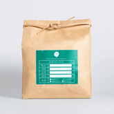 30 lb Samgwang rice bag in brown paper with label on the front