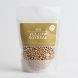 Yellow soybean pouch with visible golden beans inside