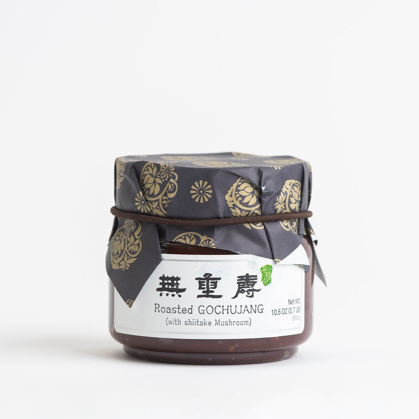 Roasted gochujang jar with floral lid and label