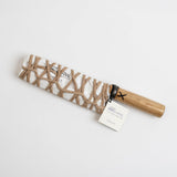 Vegetable knife wrapped with twine, dark blade and wooden handle with tag