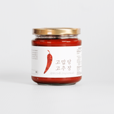 THANKYOU Gochujang jar with dark red chili paste and gold lid