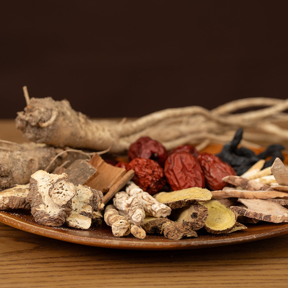 Dried herbal mix on a wooden tray