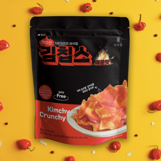 Black kimchi crunchy chips pouch with illustrated orange chips