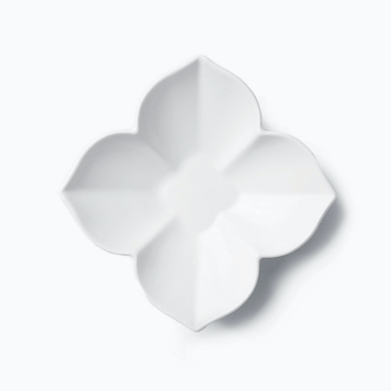 Flower-shaped dish with petal compartments, white ceramic