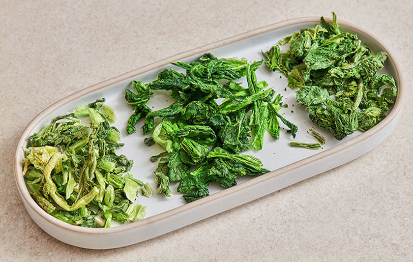 Freeze-dried green leafy namul greens in a rectangular dish