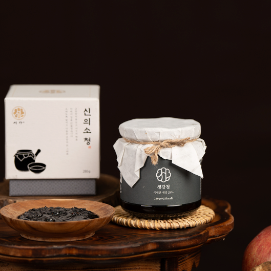 Apple ginger extract jar with white cloth seal tied with twine bow