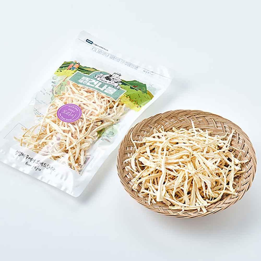 Dried radish greens in clear bag with dried pale strips in a round bowl